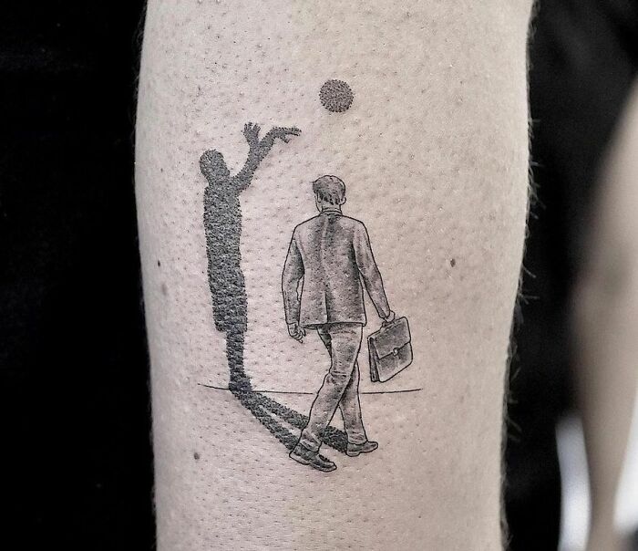 3D tattoo of a man walking with a briefcase, casting a shadow that plays basketball, showcasing artistic depth.