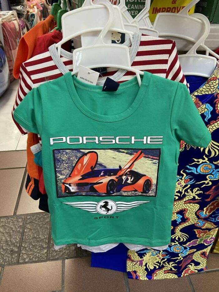 A Porsche T-Shirt With A Picture Of A Bmw And A Ferrari Logo