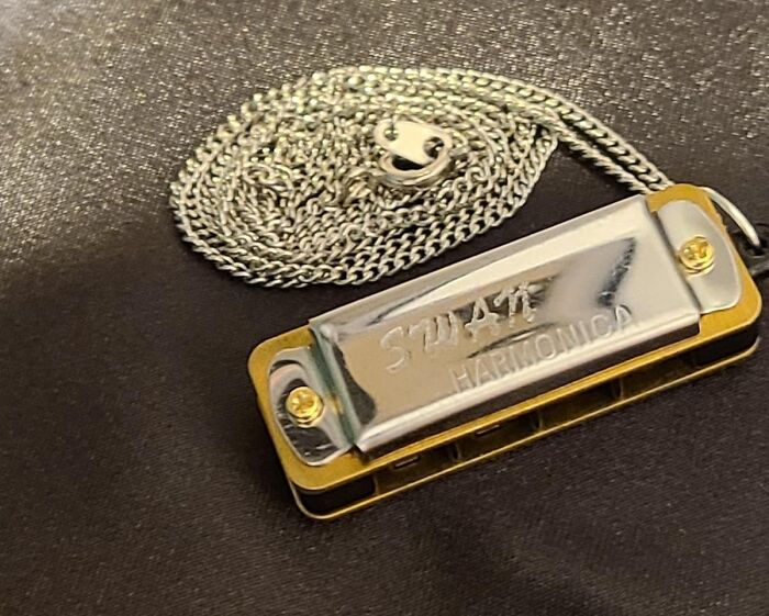 Holiday Harmonies Ahead: The Mini Harmonica - Because The Best Things Come In Small Packages, Ready To Fill Stockings With Sweet Sounds