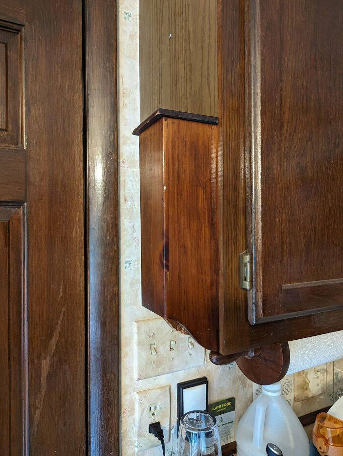 My Home Was Built In 1986. This Is On The Side Of The Upper Kitchen Cabinet. The Lid Comes Off. What Is It?