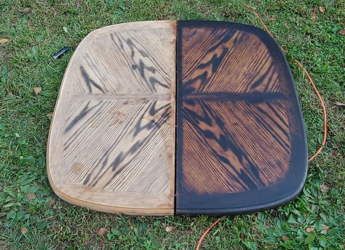 Wood table with half fresh and half weathered surfaces, showcasing results of cleaning products.