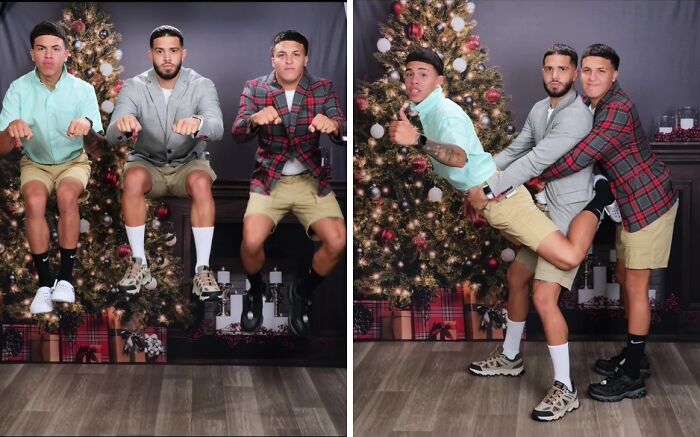 Three men pose humorously in front of a Christmas tree, capturing the awkward holiday photo trend at JCPenney.