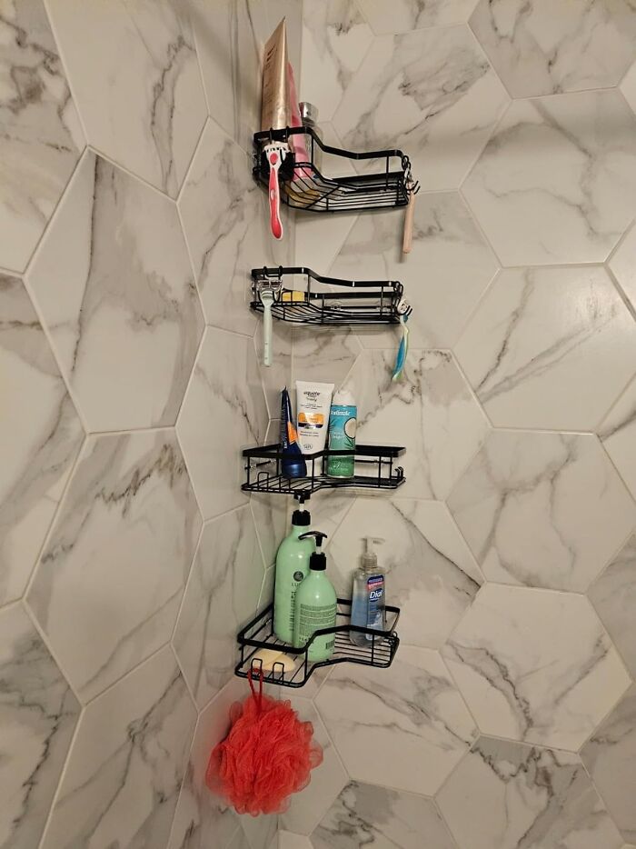 Wall-mounted shower caddy with toiletries for decluttering and organizing your home.
