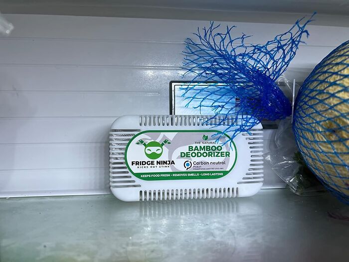 Bamboo deodorizer in a fridge, part of cleaning products for a fresh start mission.