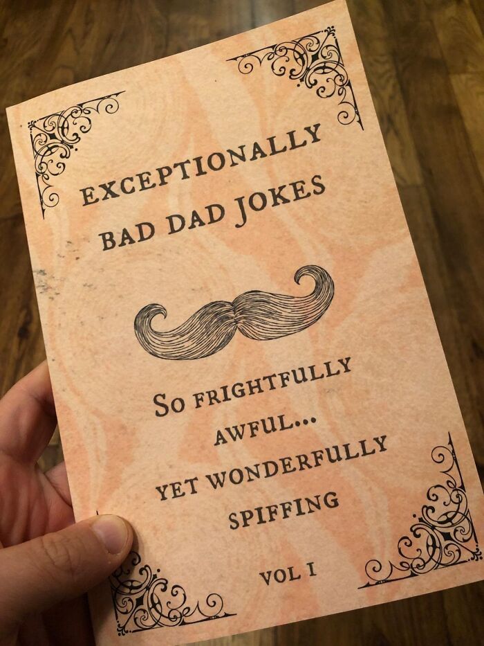 Book cover of "Exceptionally Bad Dad Jokes," held in hand, perfect last-minute gift on Amazon Prime.