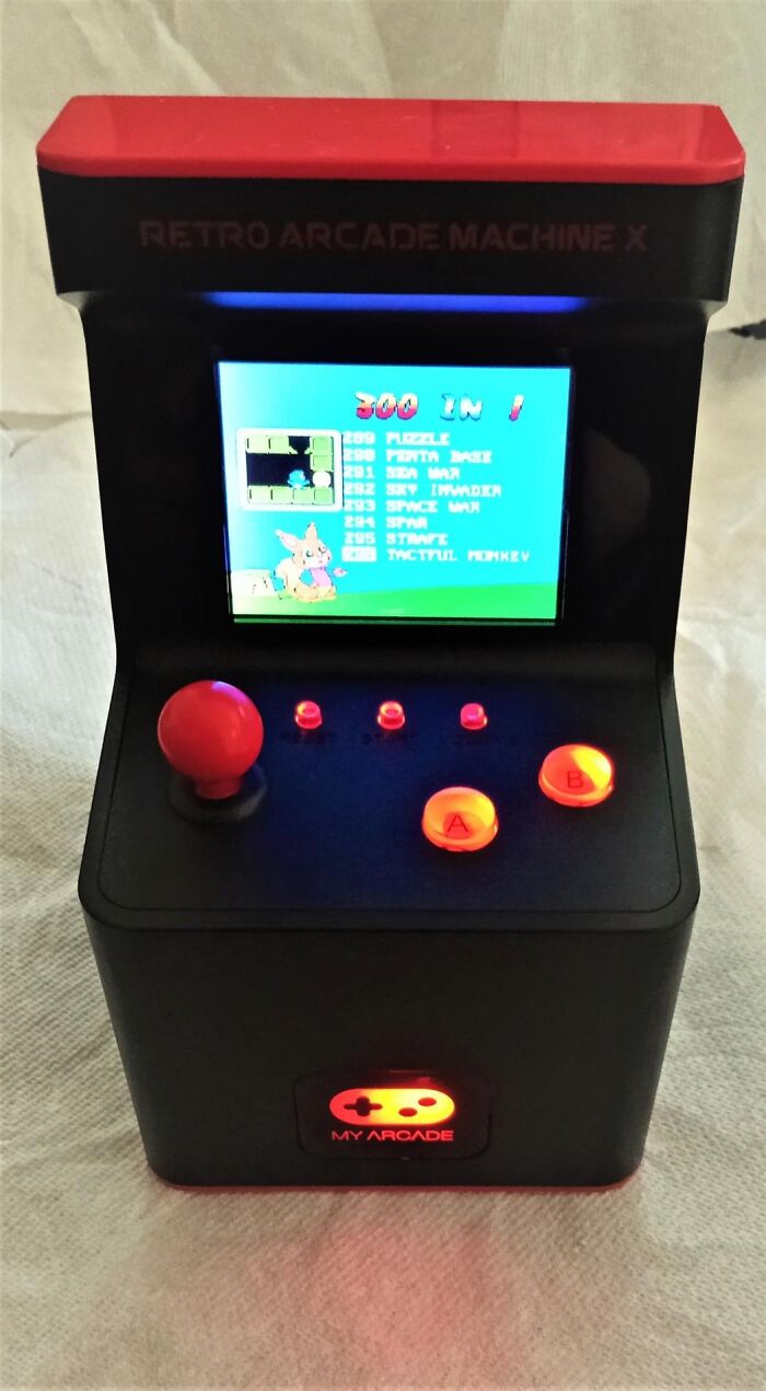 Mini retro arcade machine with joystick and buttons, a perfect Father's Day find for dads who love gaming.