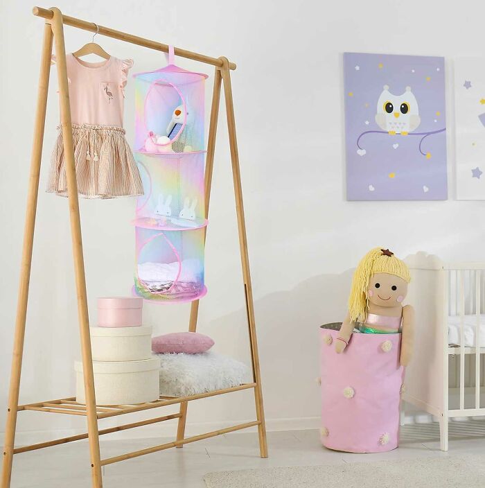 Hanging colorful storage with toys in it
