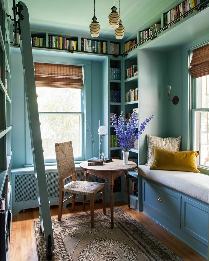 Blue Home Library With A Reading Nook