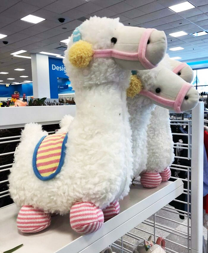 Weird Toys. What Are These Things? Mutant Llama-Sheep? And How About These Barely-There Stumps For Legs?