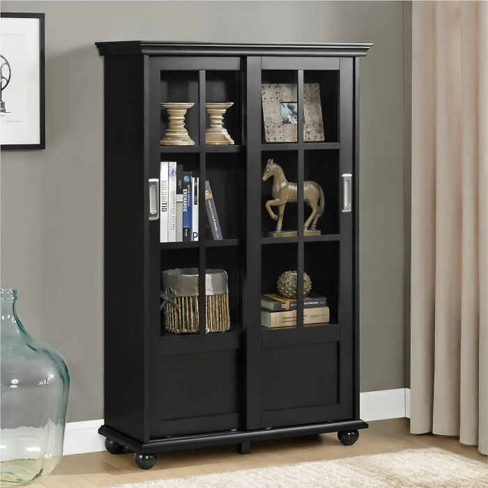Home black bookshelf with glass doors