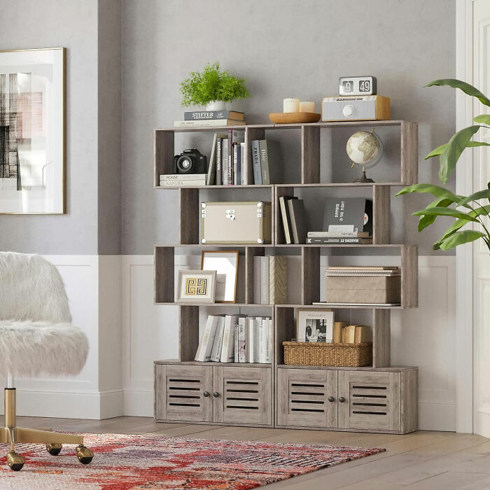 S-shaped geometric bookshelf with doors