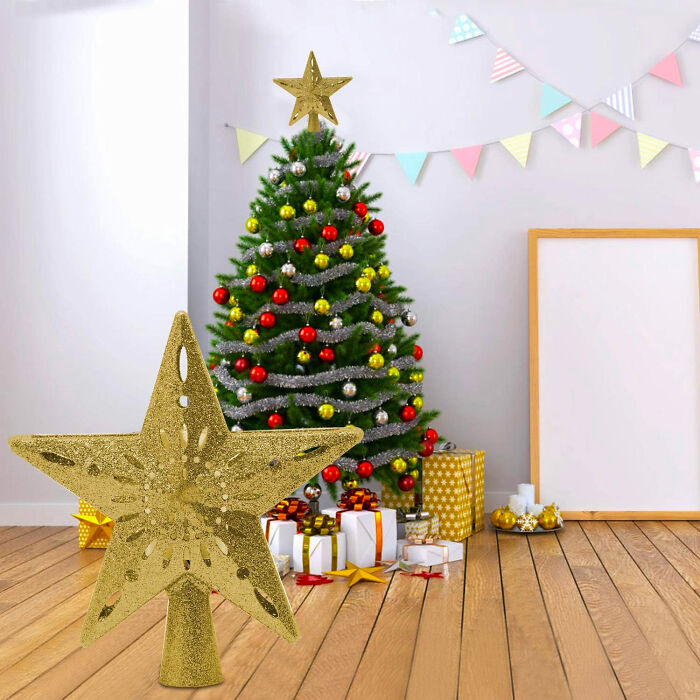 Gold star tree topper on a decorated Christmas tree with affordable Christmas decor ideas and wrapped gifts underneath.