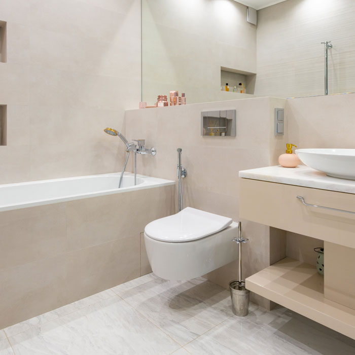 White toilet in a bright bathroom White toilet in a bright bathroom