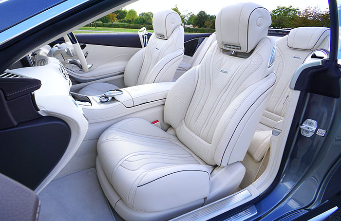 White cream seats in a car White cream seats in a car