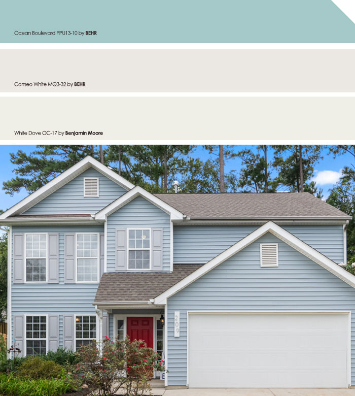 Light blue exterior house colors on a two-story suburban home with white trim and a red front door.