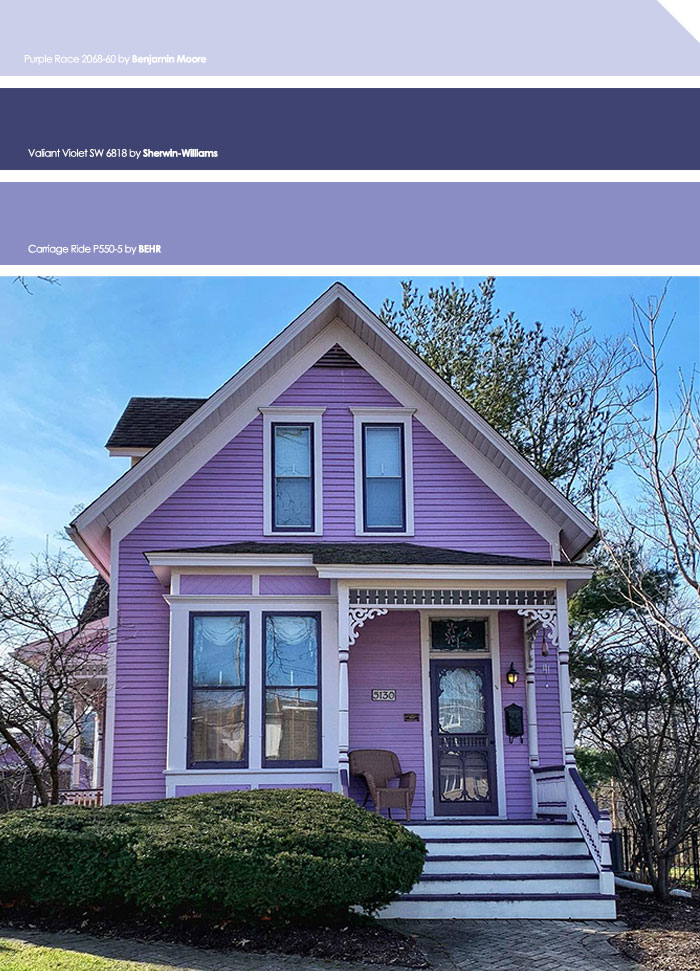 Purple painted house with white trim and porch, showcasing exterior house colors to turn heads in the neighborhood.