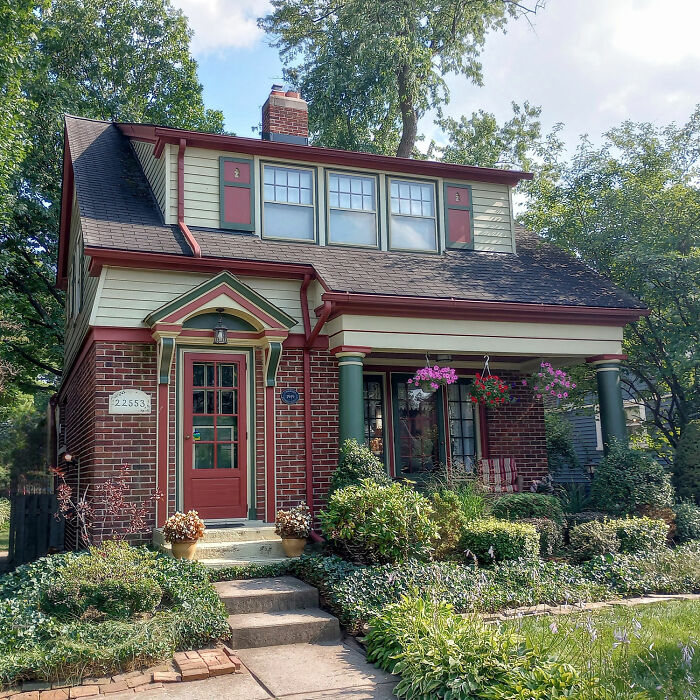 House with flowers and plants in front yard