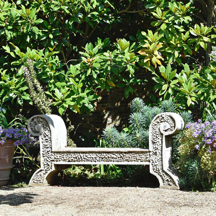 Stone bench in front yard