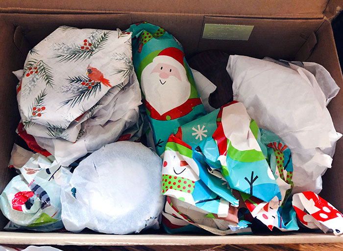 I'm Reusing Wrapping Paper To Wrap Fragile Items For Storage