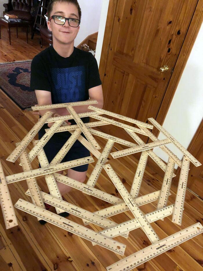29 Rulers Being Held Up By 1. If You Remove Any Of Them Then It All Comes Down