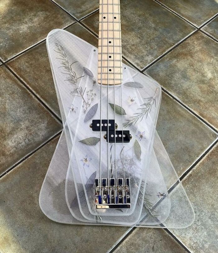 A Brute Guitars Plexigon Bass With Embedded Flowers
