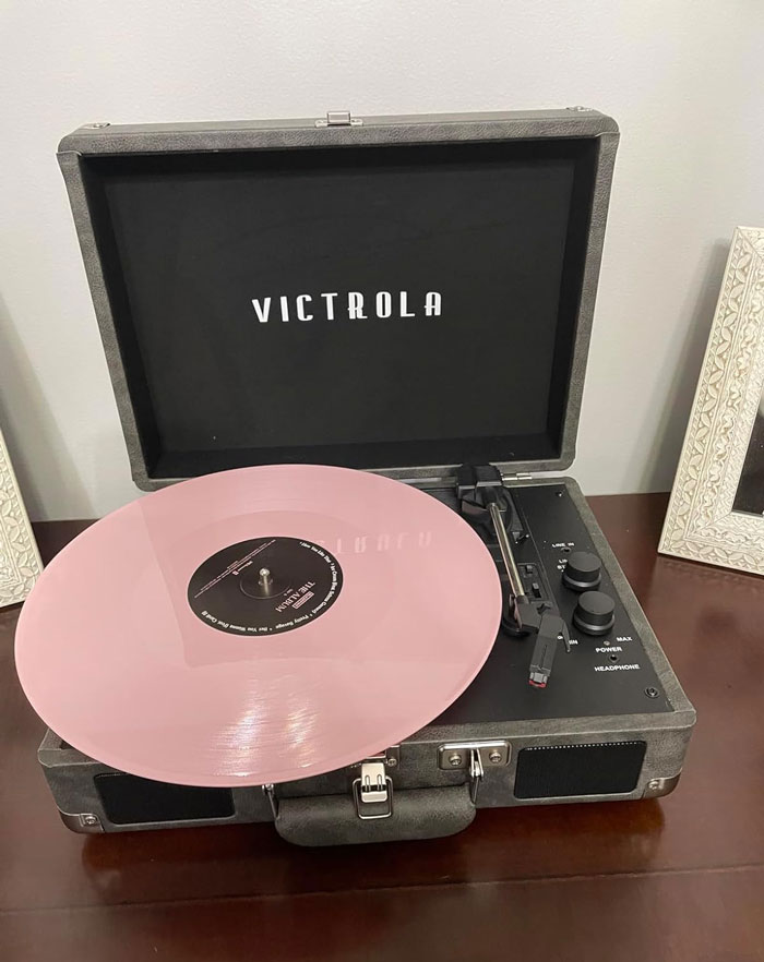 Portable Suitcase Record Player: Offers an eclectic fusion of vintage and modern, and it's basically *proof* you understand her aesthetic!