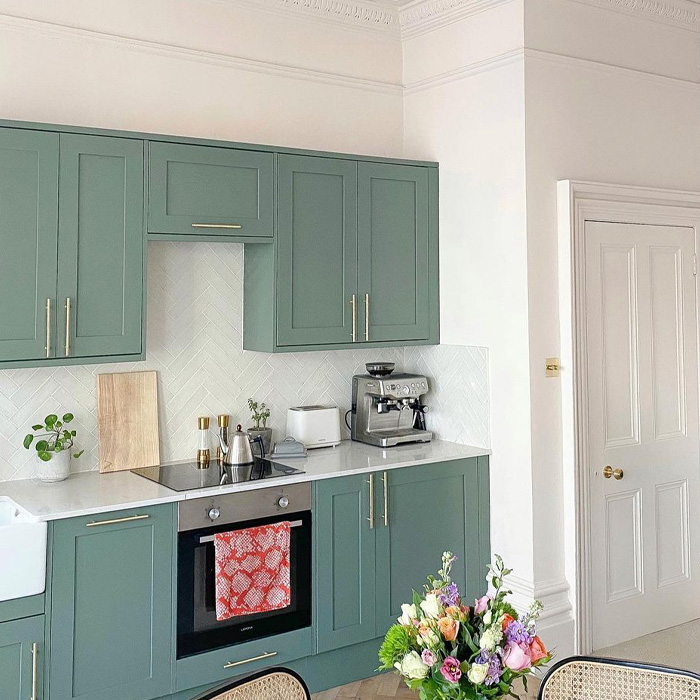 Kitchen with green kitchen cabinets&nbsp;