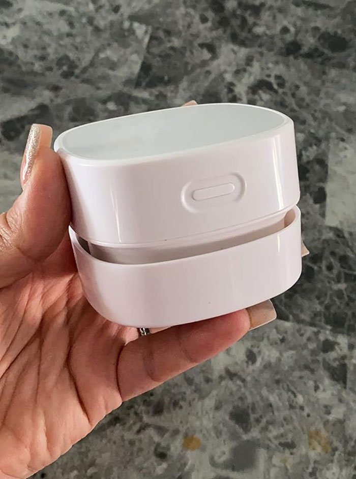 Odistar Desktop Vacuum Cleaner: That promises high suction, low noise and precisely sweeps up all dust and debris, even in hard to reach spots! Plus, it's cordless and portable for a super convenient clean-up experience.