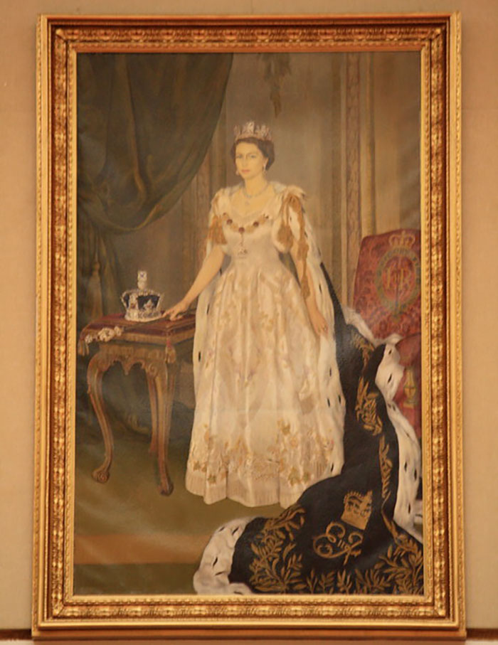 A regal portrait of a queen in royal attire, highlighting intriguing historical details often missed in schools.