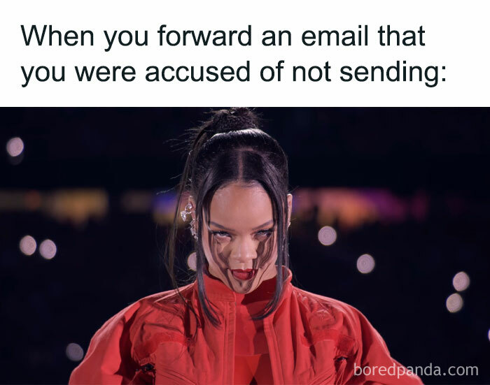 Woman in a red outfit with mischievous expression, funny work meme about forwarding emails.