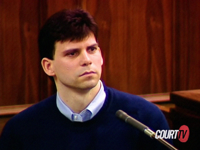 Man in a courtroom setting wearing a dark sweater, associated with Menendez Brothers' legal case.