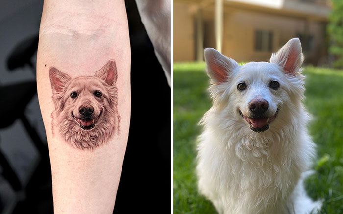 Realistic pet tattoo by Yeono on forearm next to smiling white dog outside.