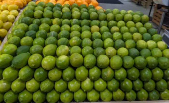 The Lemons Are Stacked On Top Of Each Other