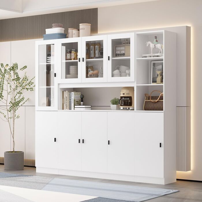 Big white wooden bookcase with LED lightning