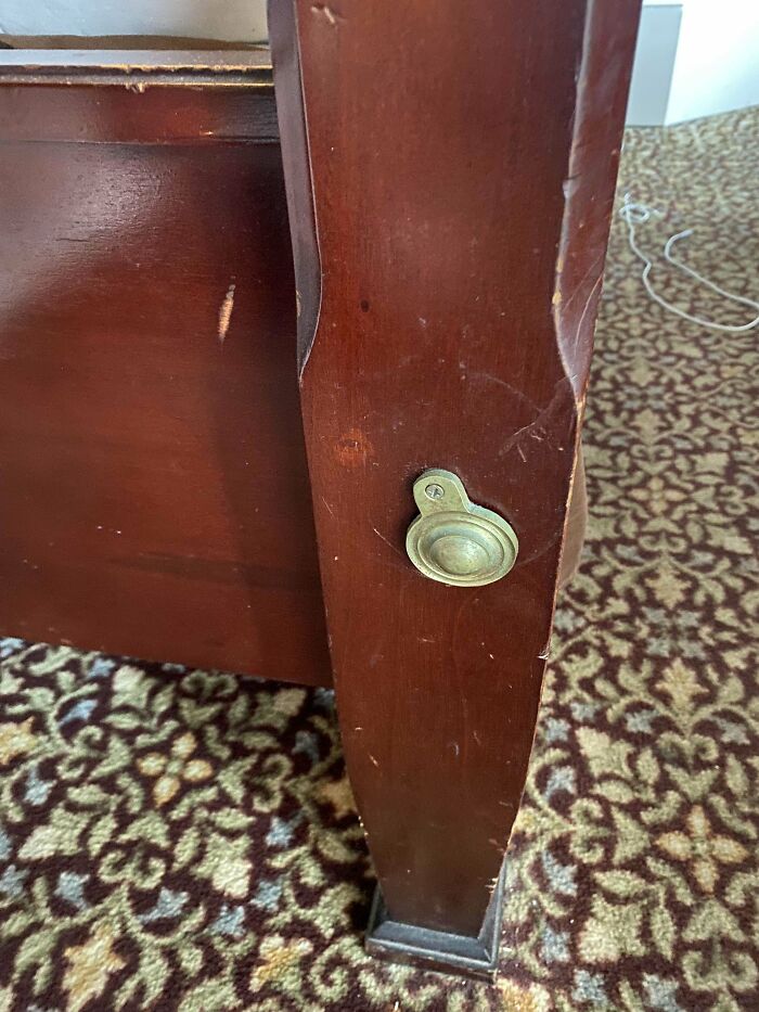 Swiveling Metal Domes On A Hotel Bed