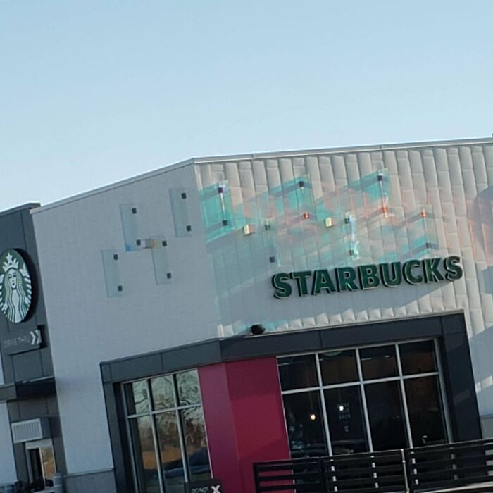 What Are These Rectangular Glass Panels On Multiple Different Buildings? They Appear To Be Different Sizes As Well