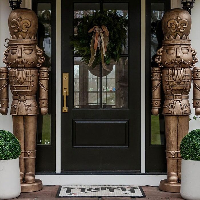 Nutcrackers sculptures near front house doors