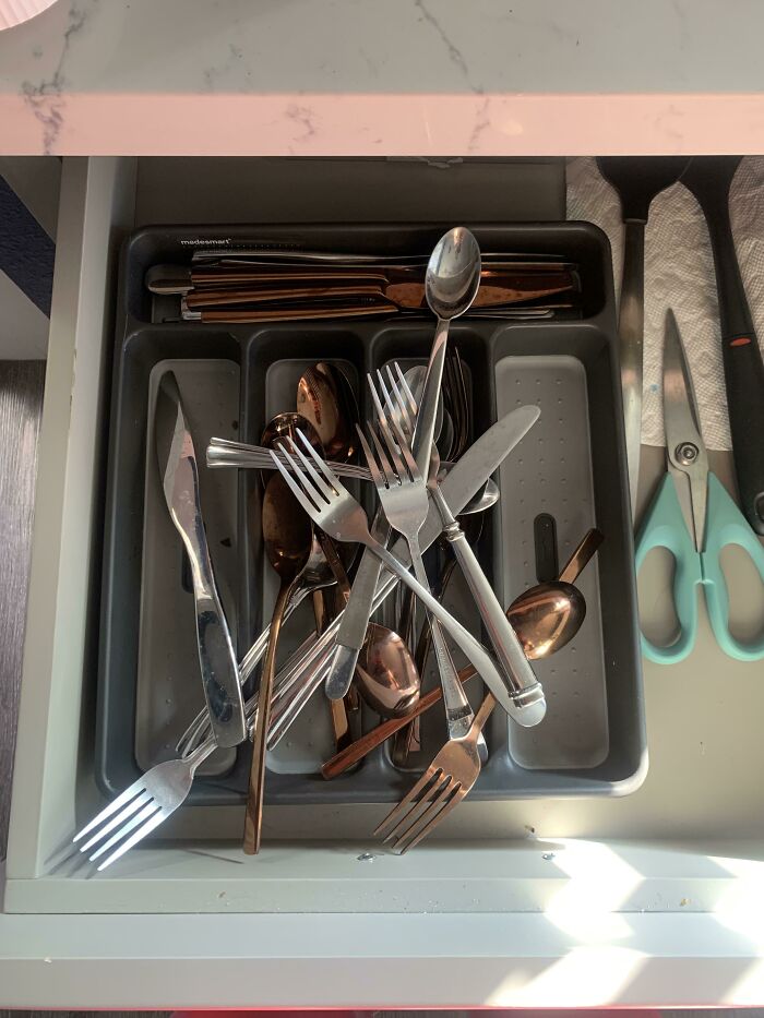 Husband Attempted To Put The Silverware Away