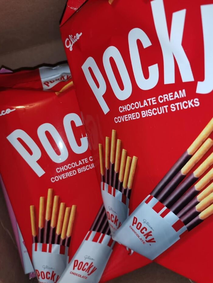 Picture This: You, Your Phone, And A Box Of Glico Pocky, Chocolate Cream Covered Biscuit Sticks – Sounds Like The Perfect Scroll Sidekick For A Sweet And Crunchy Intermission, Right? Could Only Be Made Better By Someone To Play The Pocky Game With...