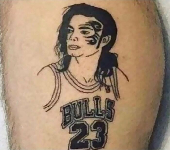 Failed tattoo of a person wearing a Bulls 23 jersey with unusual facial features and design elements.