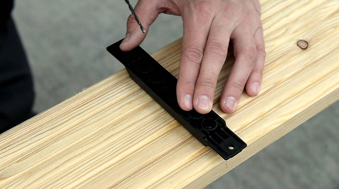 Person using hidden fasteners.