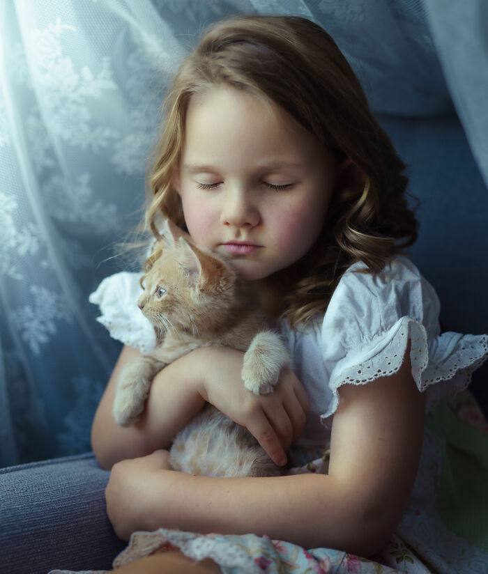 Girl And Her Kitten