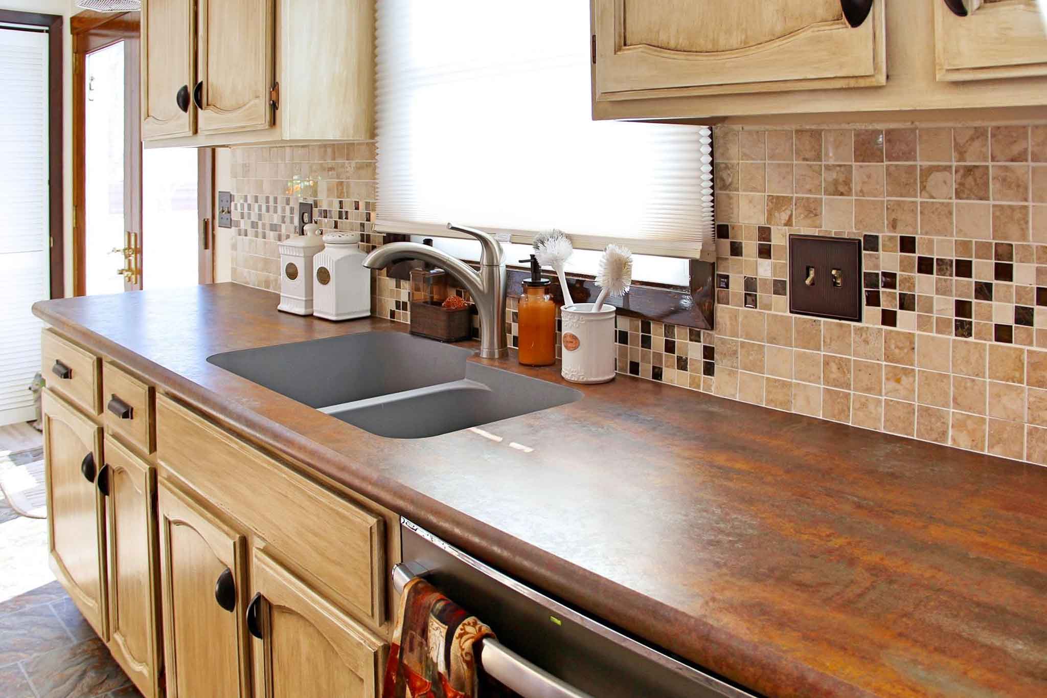 Kitchen with fire steel laminate countertop