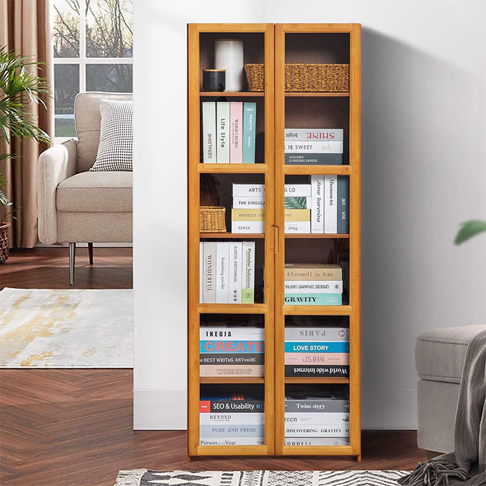 Tall brown bookshelf with glass doors