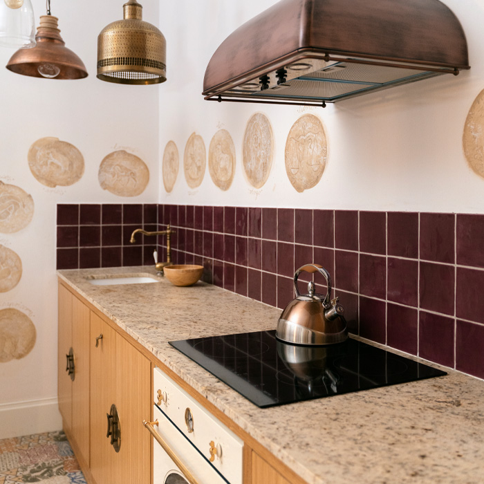 brown kitchen cabinets with corian countertop