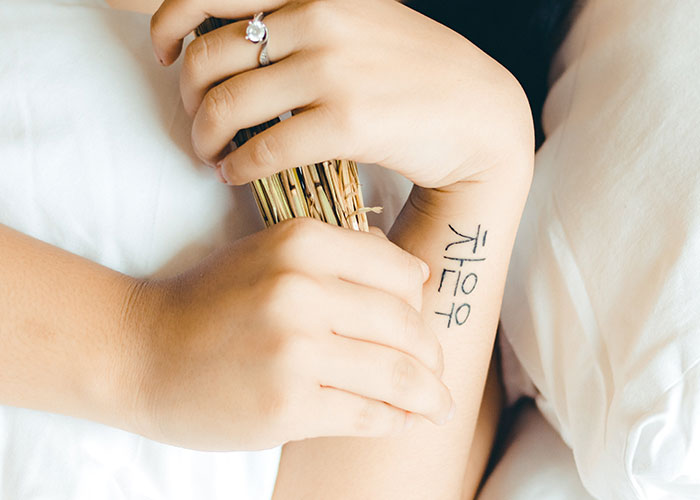 Man Gets Called Out For Telling His Friend The True Meaning Of Her &ldquo;Chinese&rdquo; Tattoo