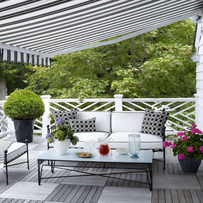 Hous porch with furniture and awning
