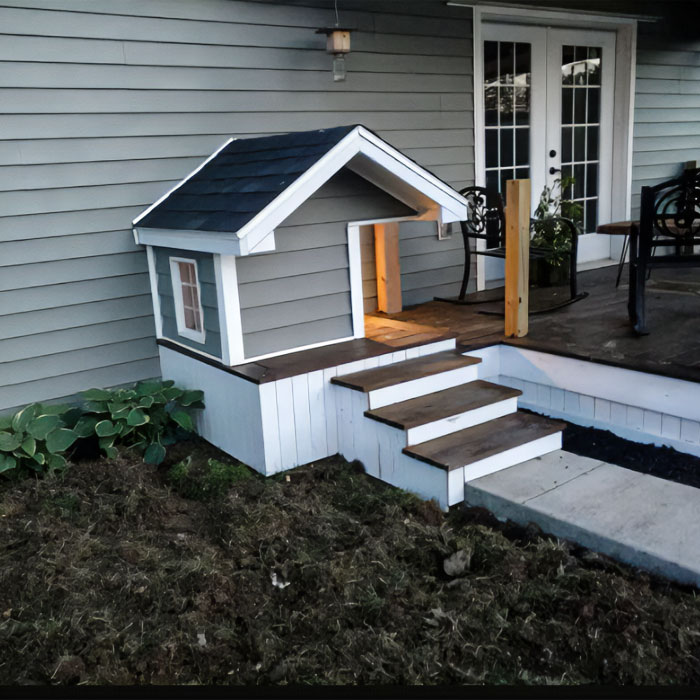 Pet house near house porch
