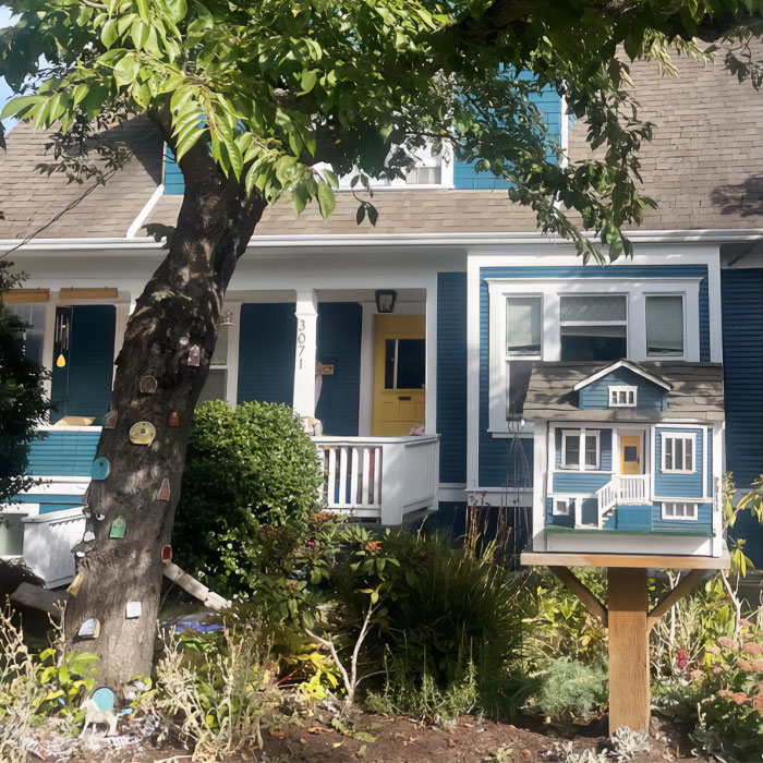 Blue house with personalized letter box