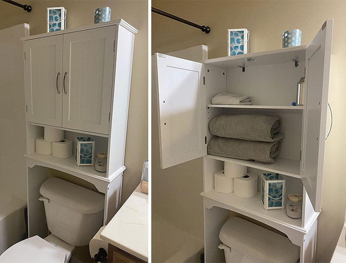 White tiny apartment furniture over toilet with storage shelves holding towels, toilet paper, and decorative items in a small bathroom.